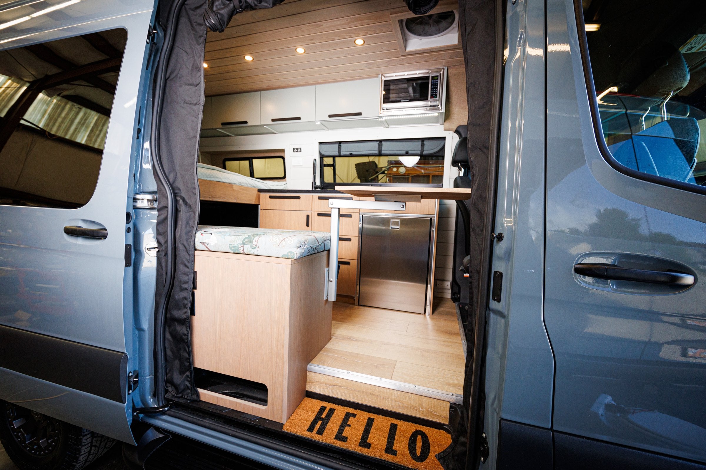 Finished van interior with galley and seating