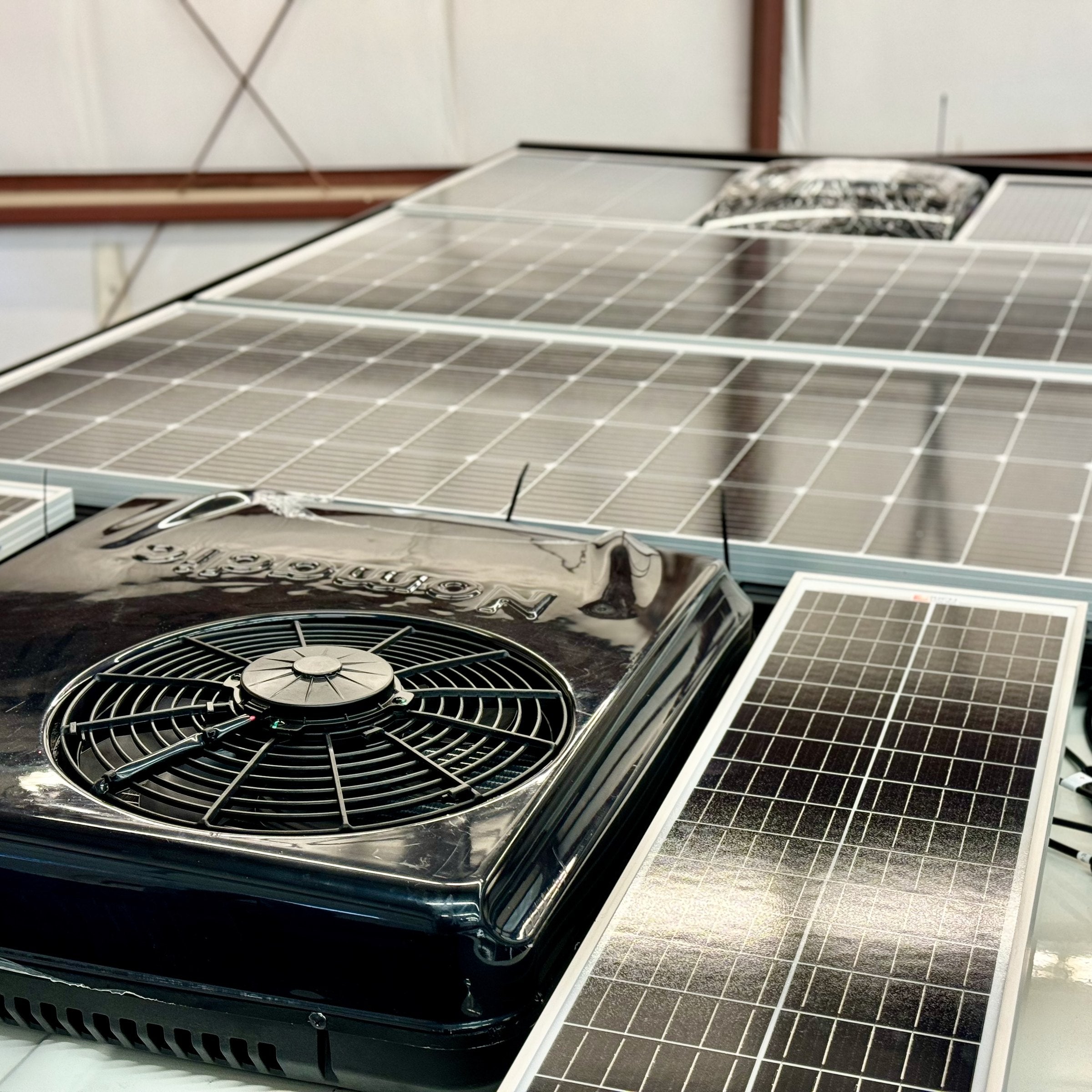 Solar panels and rooftop air conditioner